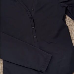 Babaton size Large Black Button-Up Long Sleeve Bodysuit